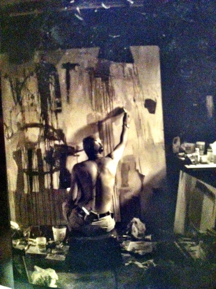 Omar McDonald painting in his studio